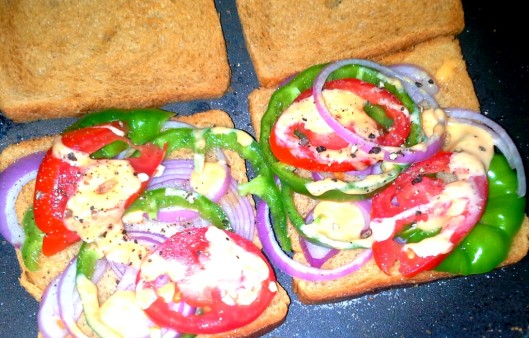 A simple, colorful toasted sandwich which is filling and nutritious.